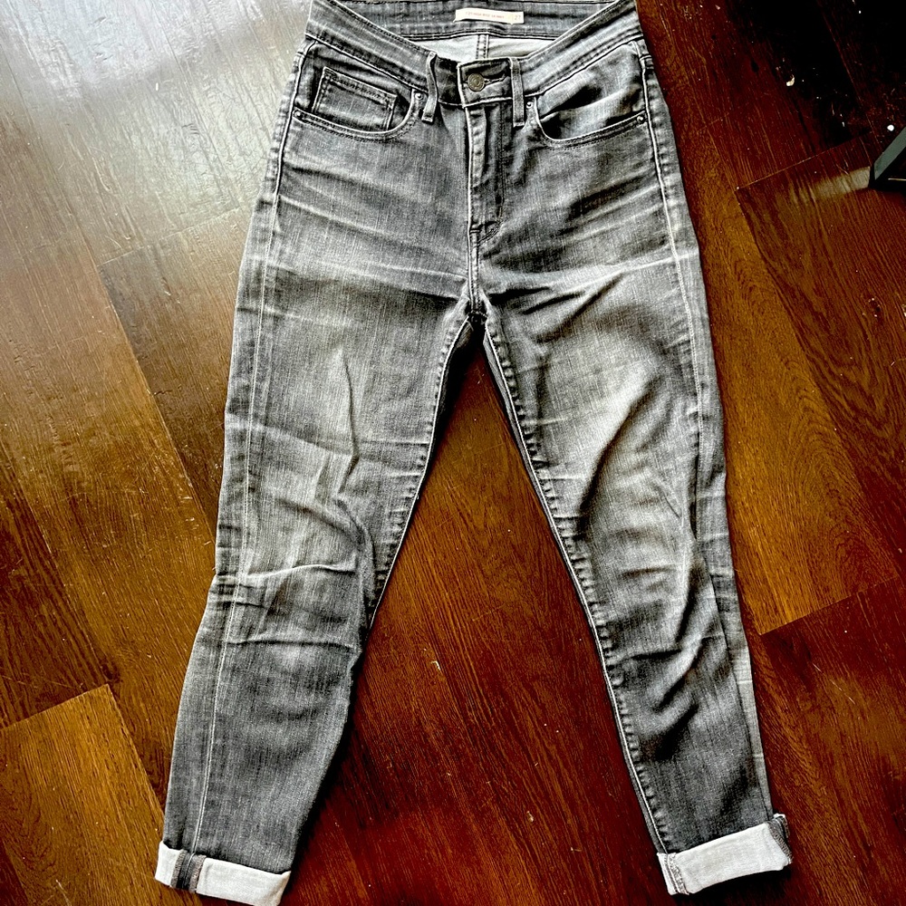Dark grey jeans.